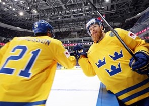 MOSCOW, RUSSIA - MAY 6: Sweden's Linus Klasen #86 celebrates at the bench with Jimmie Ericsson #21 during preliminary round action against Latvia at the 2016 IIHF Ice Hockey Championship. (Photo by Andre Ringuette/HHOF-IIHF Images)

