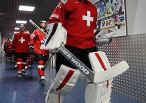MOSCOW, RUSSIA - MAY 7: Switzerland's Reto Berra #20 leads his team to the ice surface prior to preliminary round action against Kazakhstan at the 2016 IIHF Ice Hockey Championship. (Photo by Andre Ringuette/HHOF-IIHF Images)

