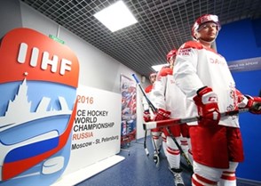 MOSCOW, RUSSIA - MAY 12: Denmark's Kirill Starkov #14 and teammates await to take to the ice for preliminary round action against Russia at the 2016 IIHF Ice Hockey World Championship. (Photo by Andre Ringuette/HHOF-IIHF Images)

