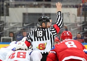 MOSCOW, RUSSIA - MAY 16: Referee Daniel Piechczek prepares to drop the puck during preliminary round action between Russia and Norway at the 2016 IIHF Ice Hockey World Championship. (Photo by Andre Ringuette/HHOF-IIHF Images)

