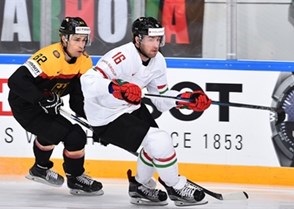 ST. PETERSBURG, RUSSIA - MAY 16: Germany's Sinan Akdag #82 battles for position with Hungary's Daniel Koger #16 during preliminary round action at the 2016 IIHF Ice Hockey World Championship. (Photo by Minas Panagiotakis/HHOF-IIHF Images)


