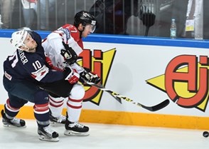 MOSCOW, RUSSIA - MAY 21: USA's Jordan Schroeder #10 battles Canada's Ryan Murray #27 for the puck during semifinal round action at the 2016 IIHF Ice World Hockey Championship. (Photo by Minas Panagiotakis/HHOF-IIHF Images)

